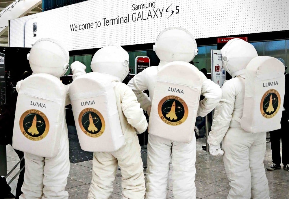 Microsoft-Devices-give-a-tongue-in-cheek-reaction-to-the-advertising-takeover-of-Heathrow-Terminal-5-by-sending-astronauts-in-search-of-the-elusive-flight-to-the-Galaxy.