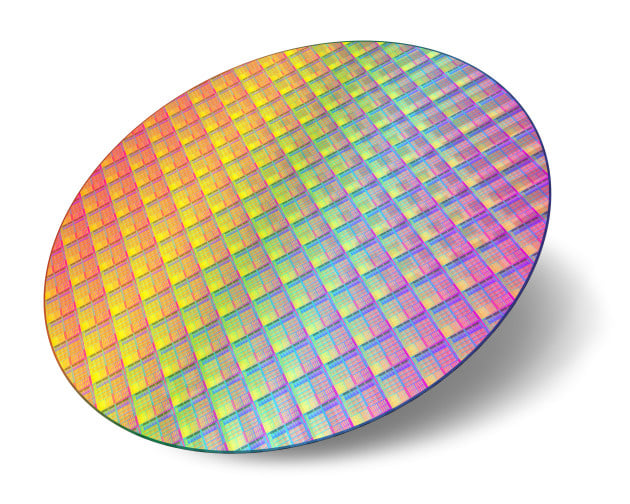 Silicon wafer with processor cores isolated on white background