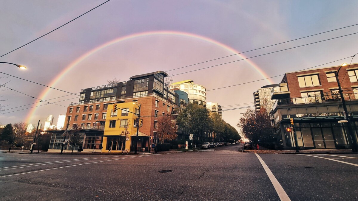 Here I used the rounded shape of the rainbow and my ultra-wide angle to position the buildings inside.  I had to go down a few blocks to make this image and I deliberately chose this framing which better highlights the rainbow.