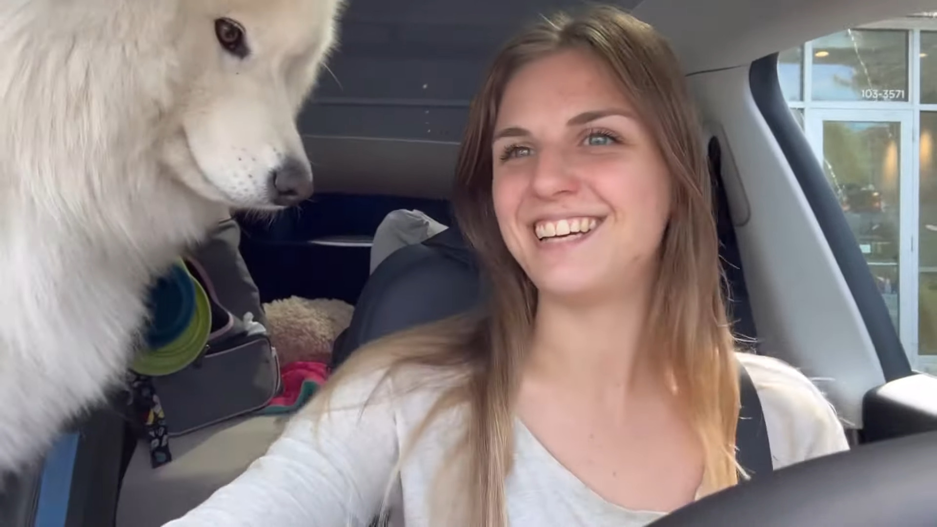 She lives in a Tesla Model Y with her dog and cat